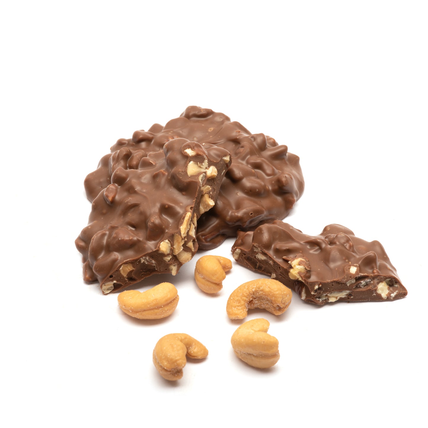 Milk chocolate-covered peanuts on a white background