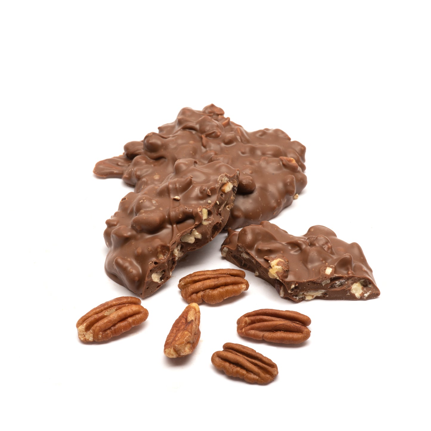 Milk chocolate pecan chortle with pecans on a white background