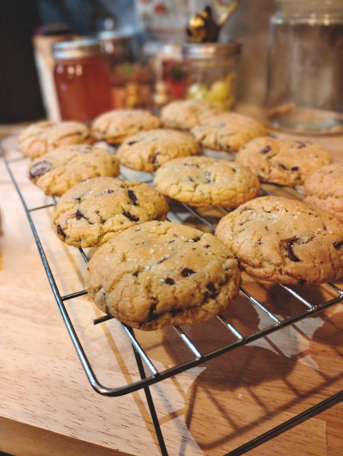 Chocolate chip cookies cooling on a wire rack