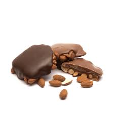 Chocolate-covered treats with almonds on a white background