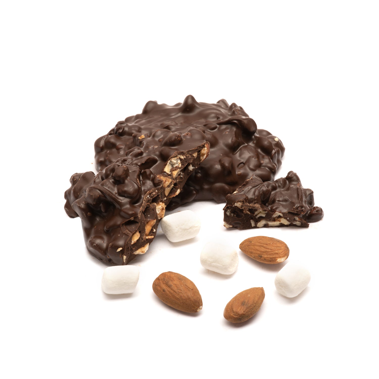 Dark chocolate-covered rocky road cluster with almonds and marshmallows on a white background