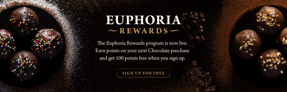 Promotional banner for Euphoria Chocolate Company's Rewards Program featuring chocolate truffles on a dark chocolate background with the text 'EUPHORIA REWARDS' and a 'SIGN UP FOR FREE' button.