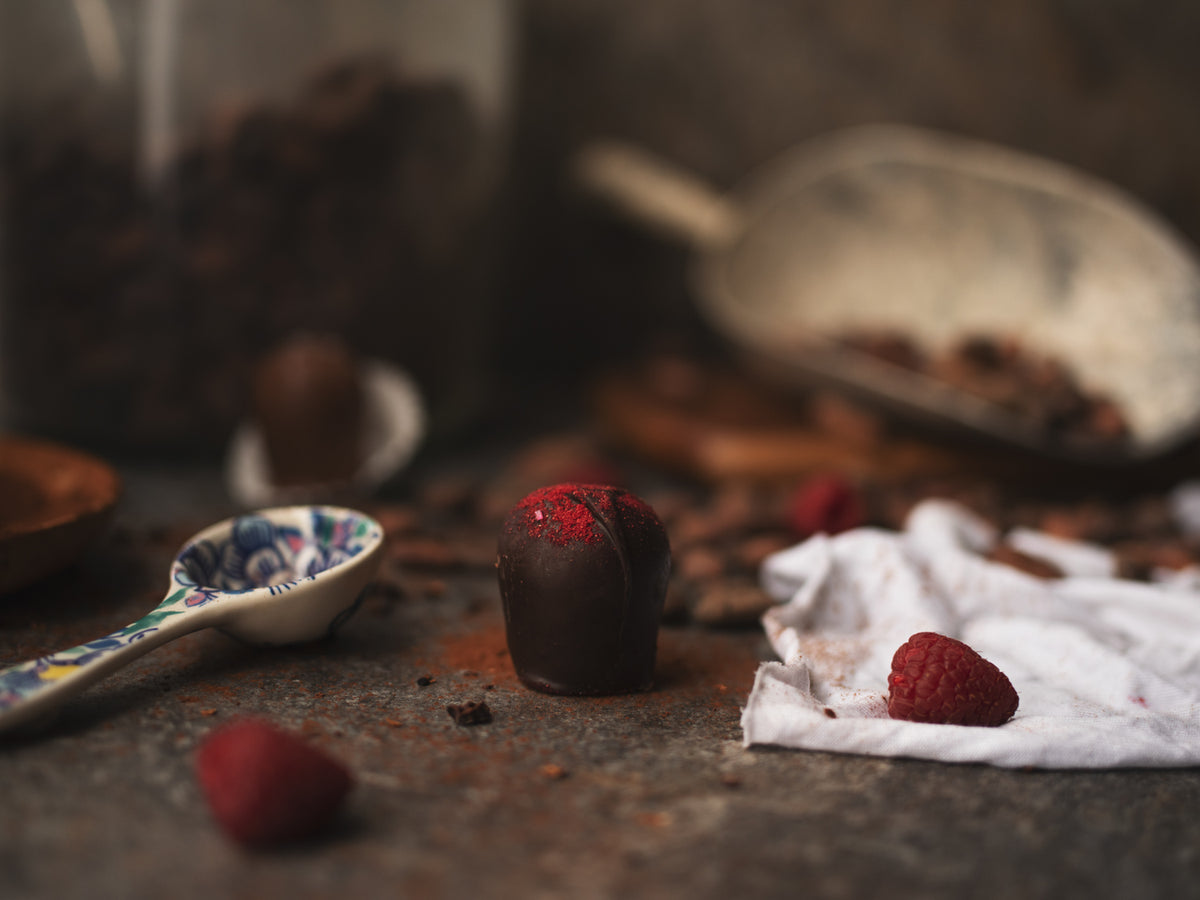 Raspberry and mayan truffle with coffee beans