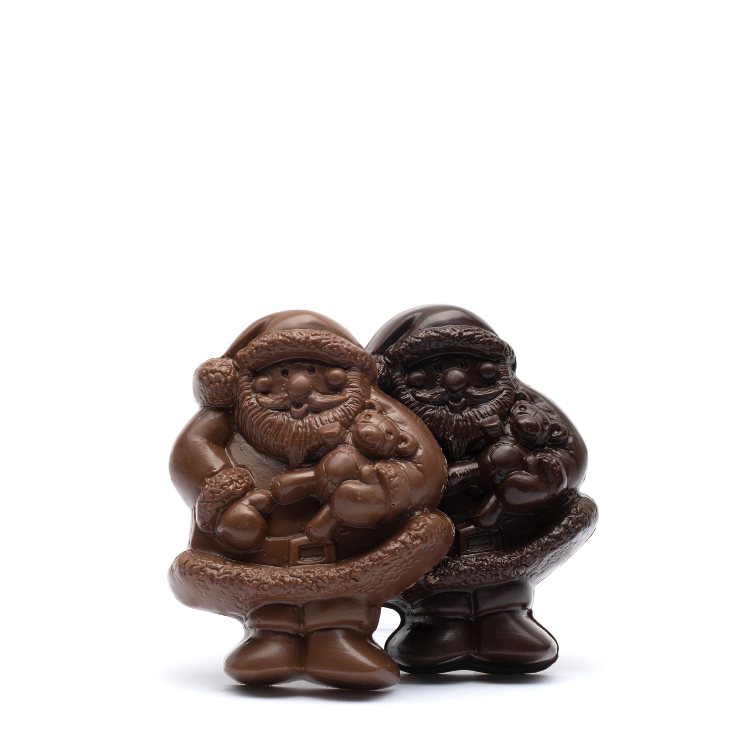 Two chocolate figures of Santa Claus on a white background