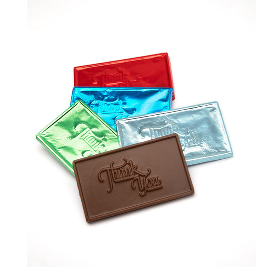 Chocolate bar with 'Thank You' text and colorful wrappers on a white background