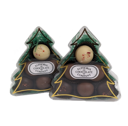 Two Christmas tree-shaped chocolate gift boxes with 'Euphoria Chocolate Company' labels on a white background.
