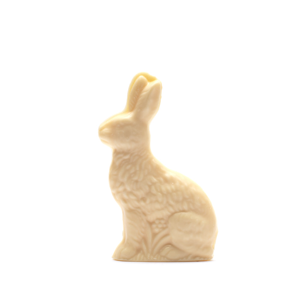 A white chocolate rabbit on white background