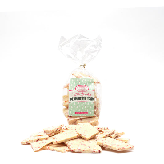 A clear plastic packaging containing white peppermint bark chocolate with visible crushed peppermint candy pieces. The package has a label with the Euphoria Chocolate Company logo and the product name.