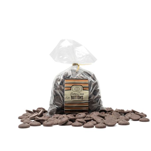 A resealable plastic bag filled with extra dark chocolate buttons, with a label showing the Euphoria Chocolate Company brand and the product name. Additional chocolate buttons are scattered around the base against a white background.