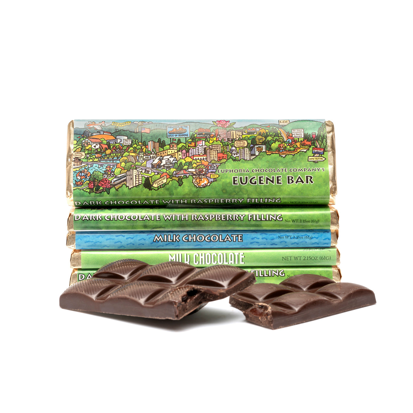 Stack of dark chocolate bars with a wrapper featuring a hand-drawn illustration of a town. The town illustration is colorful and depicts a scenic view, and the bars are broken to show the chocolate inside.