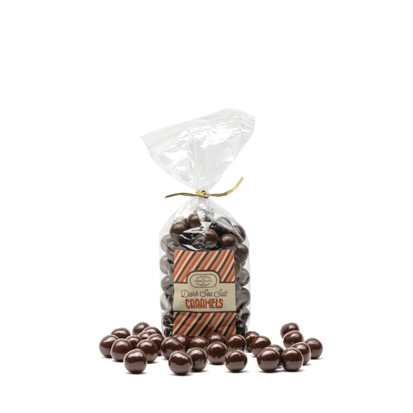 A clear plastic bag filled with round dark chocolate candies with a caramel and sea salt center, and sealed with a gold twist tie. A Euphoria Chocolate Company label on the front displays the product name.