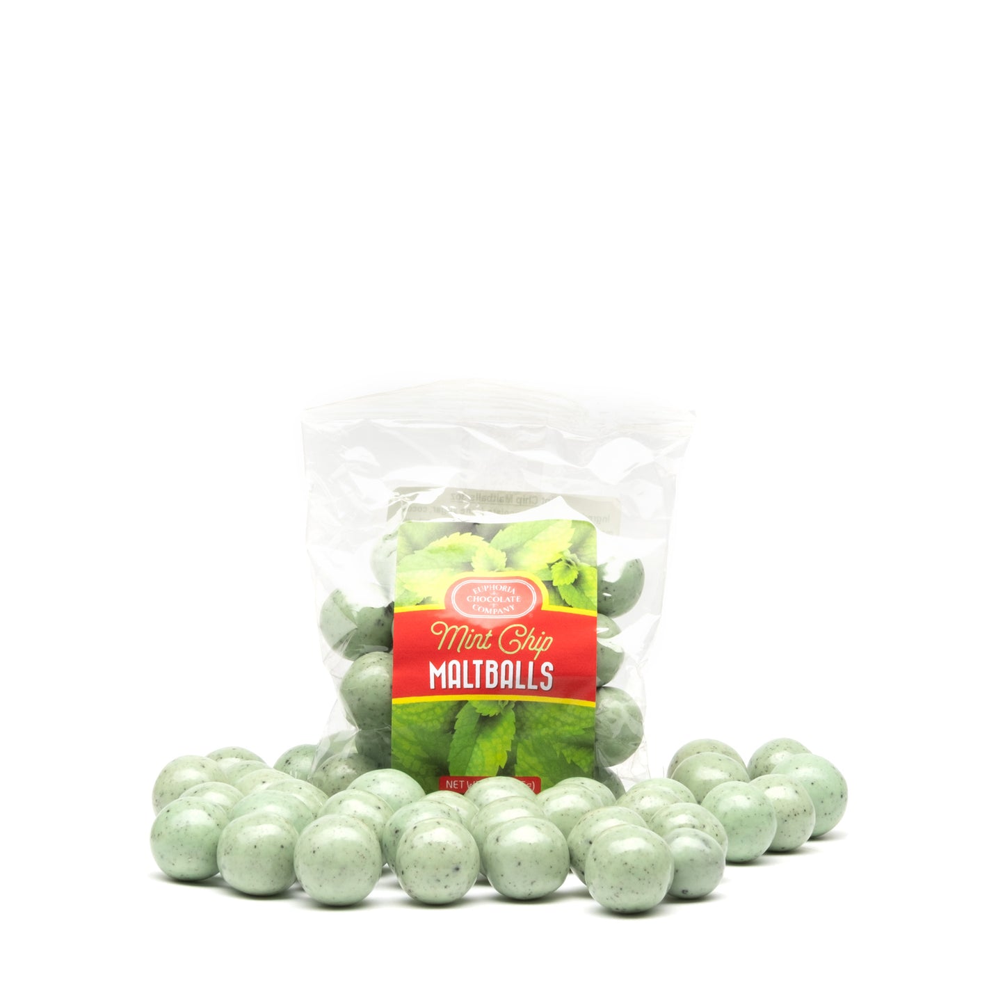 A bag of mint chip maltballs with a Euphoria Chocolate Company label against a white background and loose maltballs surrounding the bag.
