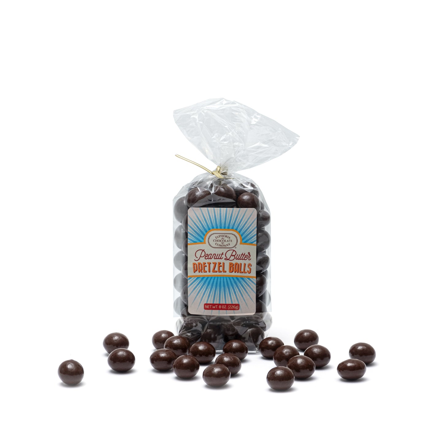 A clear plastic packaging containing dark chocolate covered pretzel balls with a Euphoria Chocolate Company label reading 'Peanut Butter Pretzel Balls' against a white background.